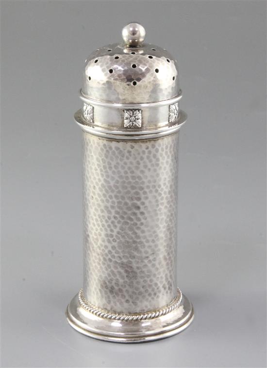 A George V Arts & Crafts silver sugar caster, by Albert Edward Jones, Height 168mm Weight: 5.7oz/180grms